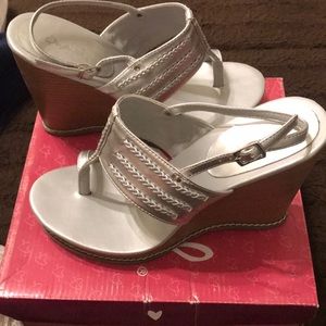 Women’s size silver 7 1/2 wedge Sandals